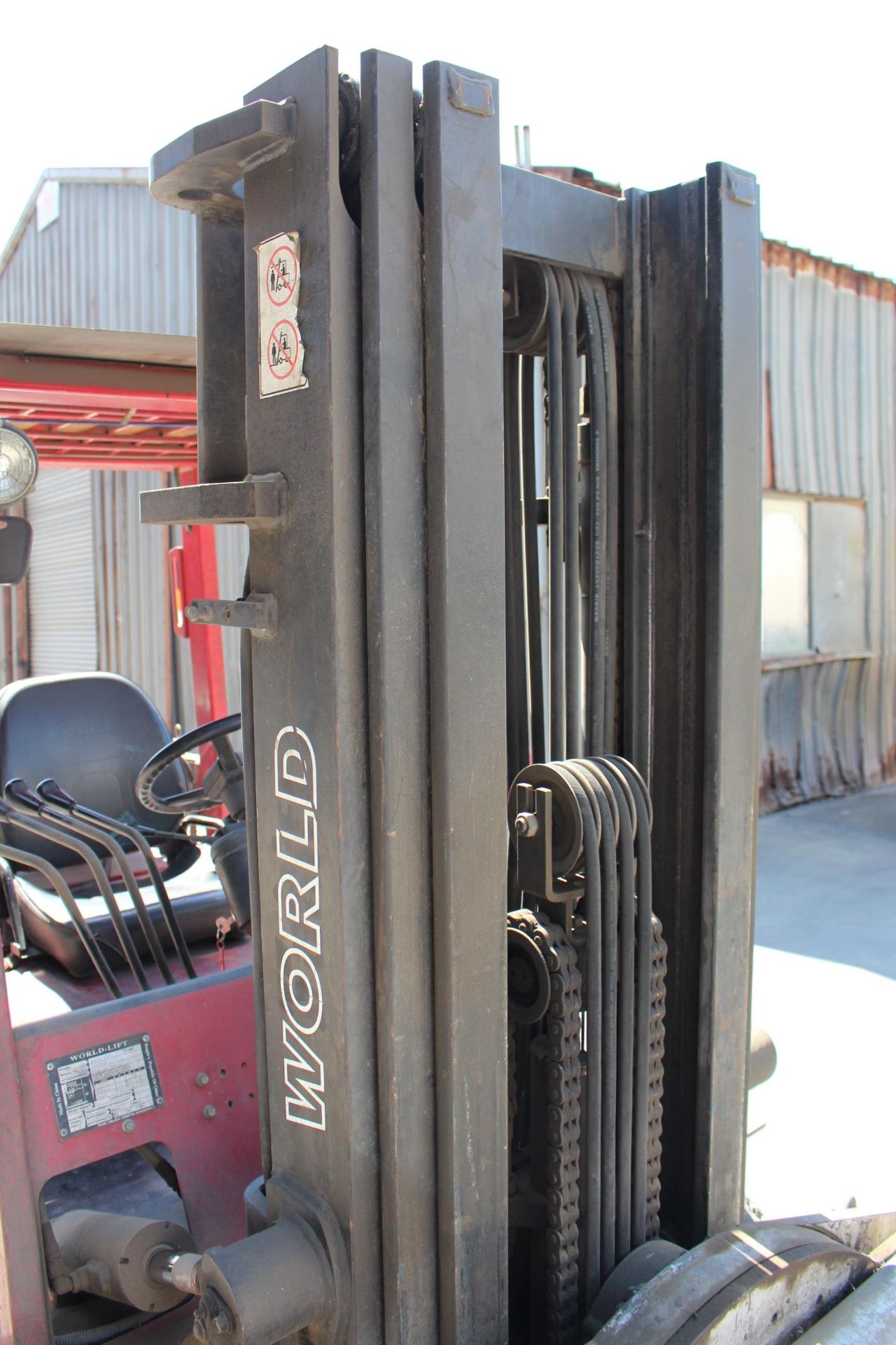 WORLD-LIFT FORKLIFT, MODEL WFG-497T, 6,000 LB CAP, 3-STAGE MAST, W/ FORK ROTATOR, S/N 318288B - Image 4 of 9