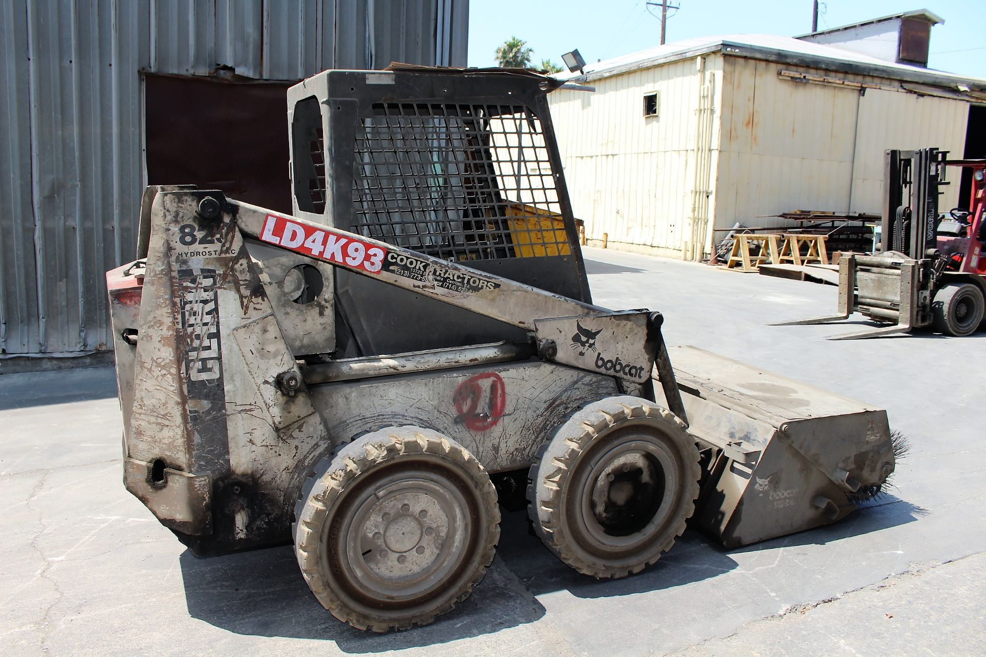 PHOTOS OF SKID STEER, STAKE BED TRUCK, FORKLIFTS, (186) METAL BINS AND SHOP EQUIPMENT