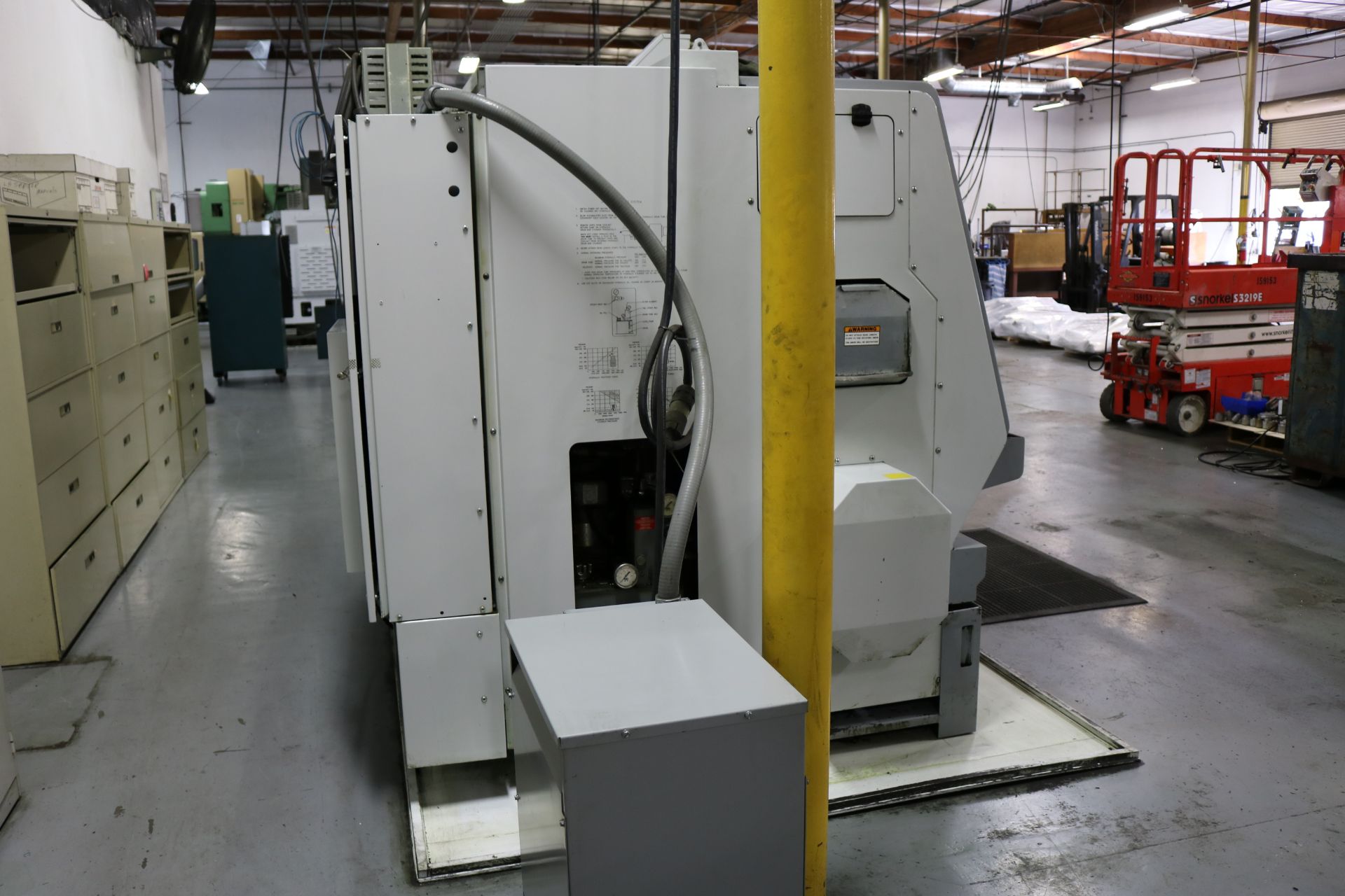 2004 HAAS TL-25 CNC TURNING CENTER, 10" 3 JAW CHUCK, 30" SWING, 14.5" SWING OVER CROSS SLIDE, 4" BAR - Image 9 of 13