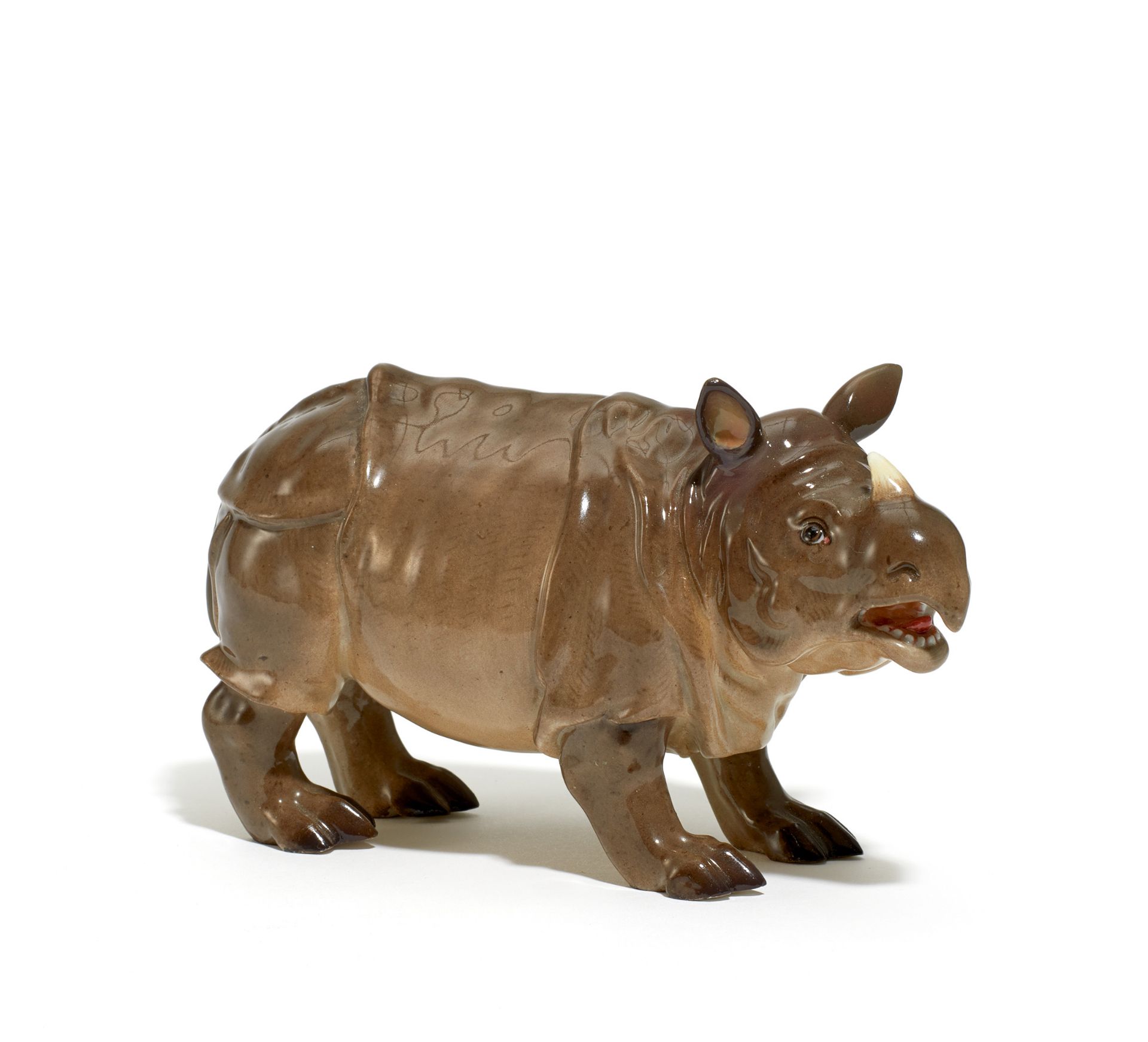 NASHORN. Meissen. Vor 1924. Modell J.J. Kaendler. Porzellan, grau staffiert. Höhe 9,5cm.