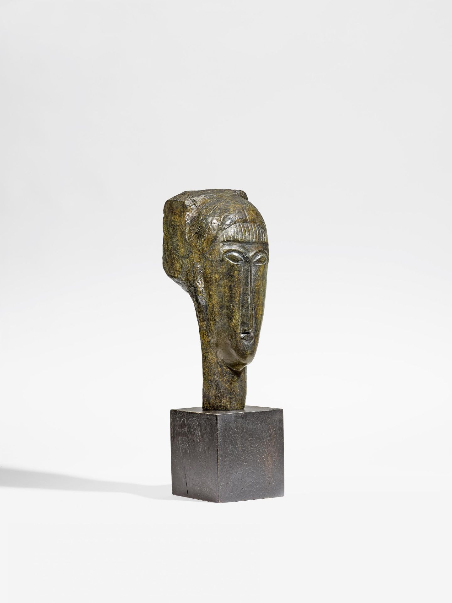 Modigliani, Amedeo1884 Livourne - 1920 ParisnachTête de jeune fille à la frange. Bronze, braun