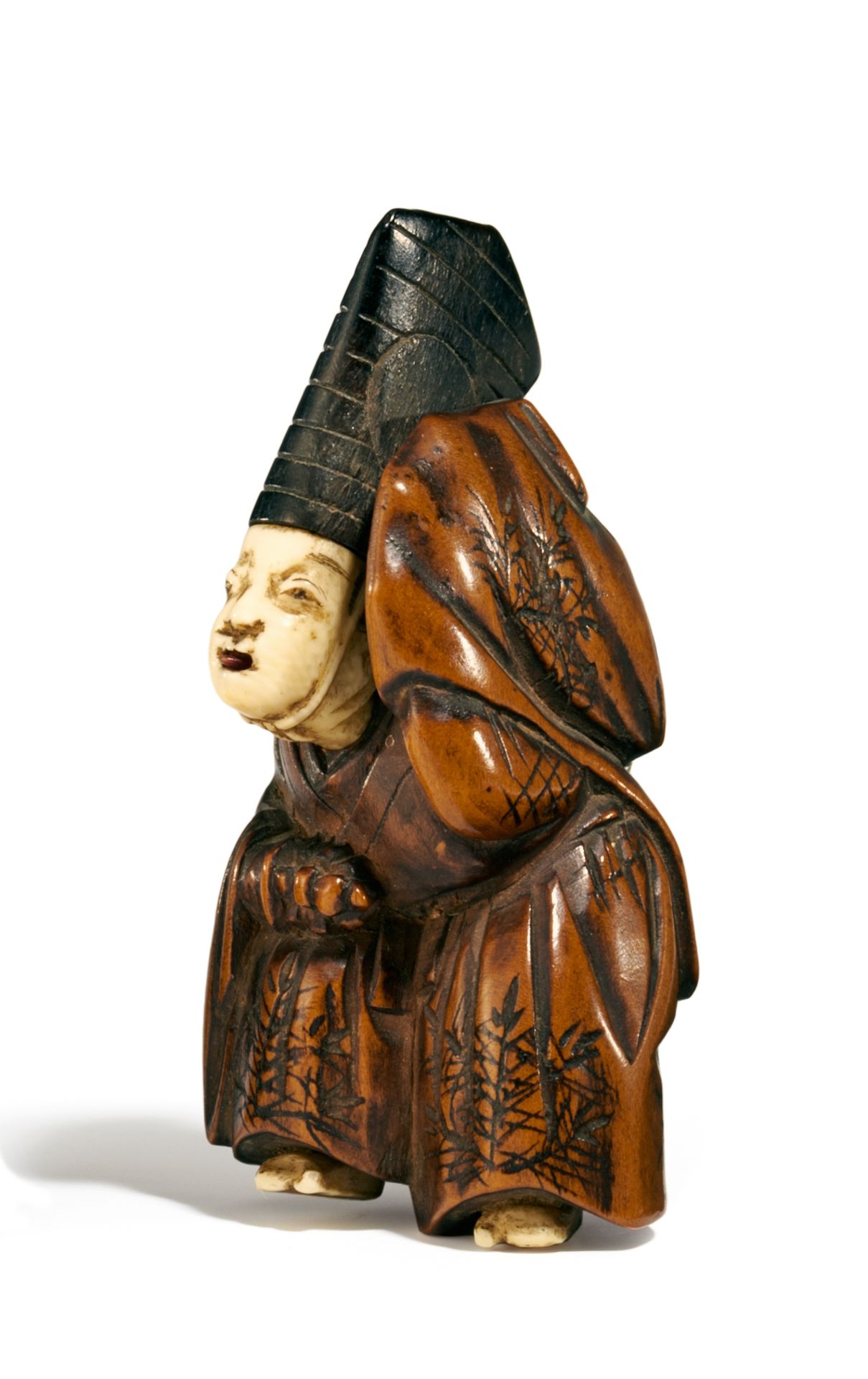 NETSUKE: SAMBASO-TÄNZER MIT BEWEGLICHER ZUNGE. Japan. 19. Jh. Elfenbein, Buchsbaum, Ebenholz und