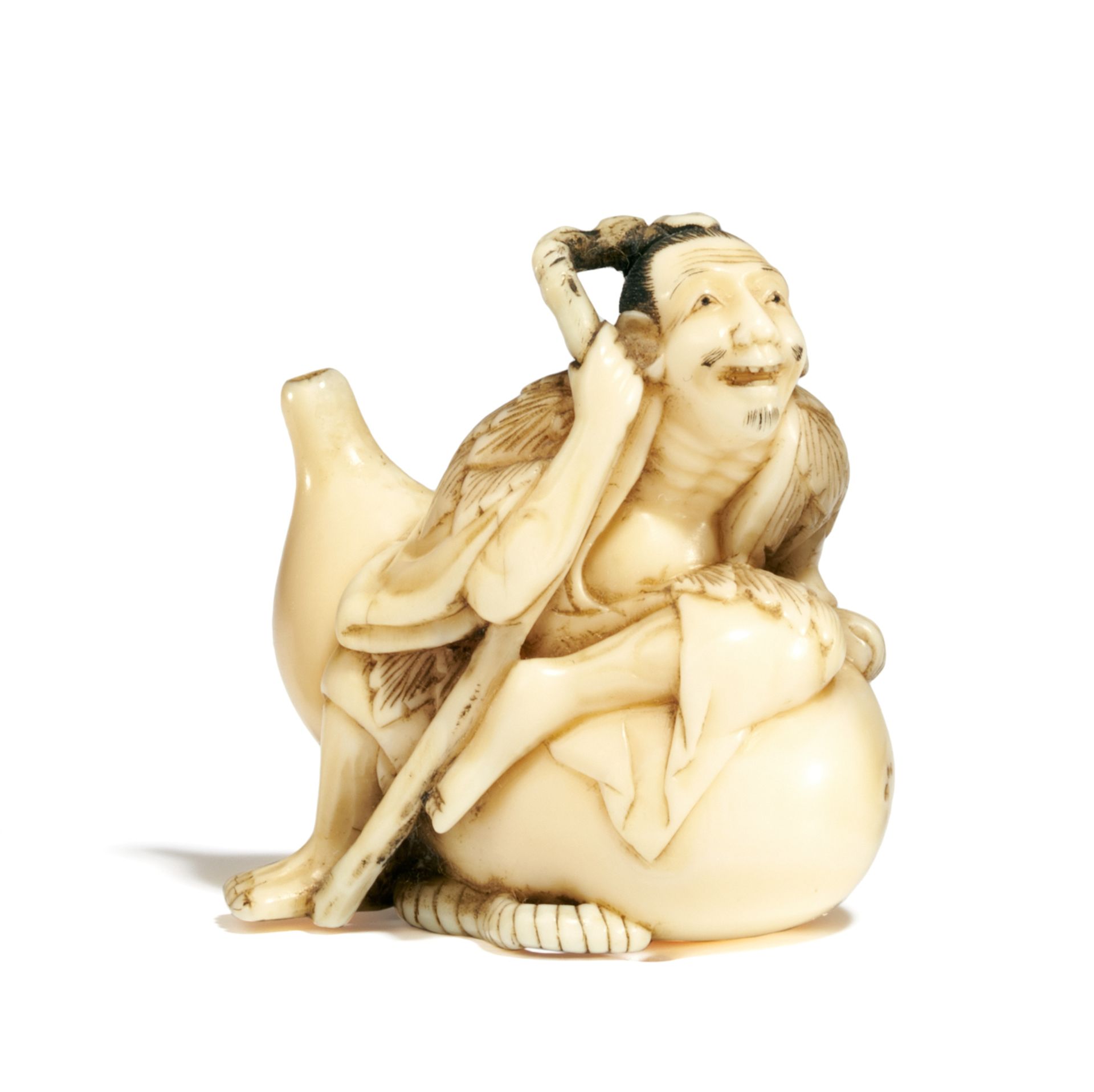 NETSUKE: SENNIN CHOKWARO AUF EINER RIESIGEN KALEBASSE SITZEND. Japan. Meiji-Zeit. Spätes 19. Jh.