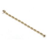 14 krt. gouden schakelarmband, lengte 19 cm, breed 8 mm, gewicht 15 gram