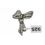 A French silver bow brooch. Set with simili. Sterling silver. 20th century. Maker's mark unclear.