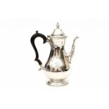 An English silver coffeepot. Hallmarked London, 1898-1899. Maker's mark Haseler Brothers (Edward