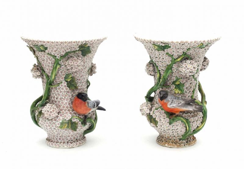 Two Meissen 'Snowball' vases, applied with a bird in coloured plumage, perched amongst balls of