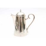 A Danish silver milk jug. Hallmark Copenhagen. Maker's mark Simon Groth. Hoogte 21 cm. 29.00 %