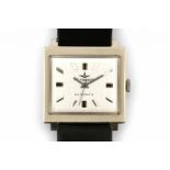 A 14 krt white gold square shaped wrist watch. Automatic. Brand Dugena. Roman numerals. Plexiglass