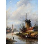 Jan Jacob Coenraad Spohler (1837-1922) Two women by a mill on the water's edge. Signed with