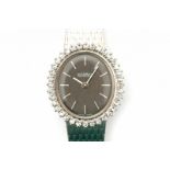 A 18 krt white gold ladies' wrist watch. Manual winding. Brand Roamer. Bezel set with single cut