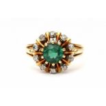 A yellow gold cluster ring. Set with rose cut diamonds and a facetted green tourmaline. Ringmaat 18