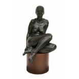 Irénée Duriez (1950-) A bronze sculpture. Femininity (2000). On round bronzed metal base. Signed