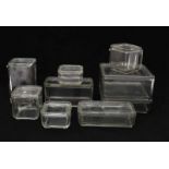 Wilhelm Wagenfeld (1900-1990) Nine clear moulded glass boxes and covers from the "Kubus-Geschirr",
