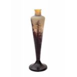 Emile Gallé (1846-1904) A tall cameo glass vase decorated with a mountainous landscape, circa 1900,