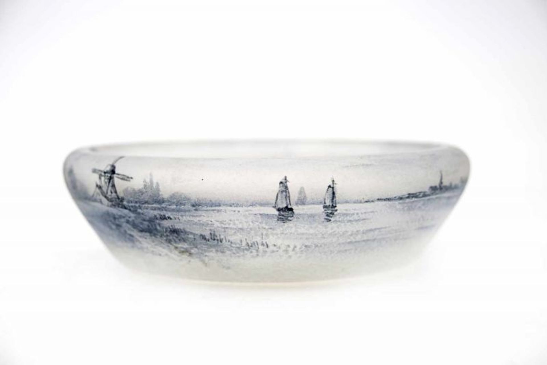 Daum, Nancy A glass bowl with enamelled decoration of ships and a landscape on frosted ground,