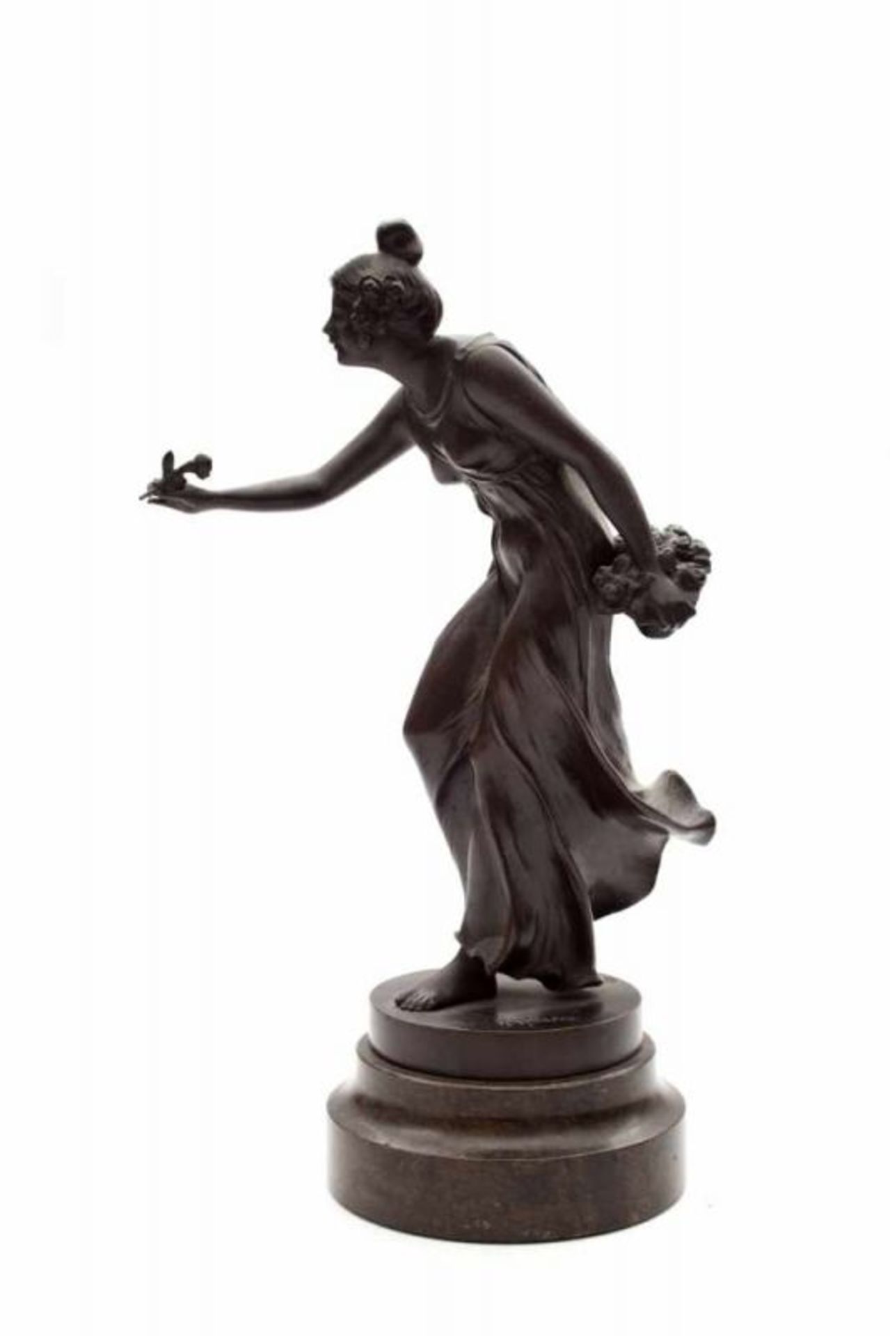 Rudolf Küchler (1867-1954) A patinated bronze sculpture of classical maiden with a flower basket,