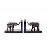 Art Deco A pair of metal and black marble bookends shaped as elephants, unsigned. 11 x 14,5 x 8,5