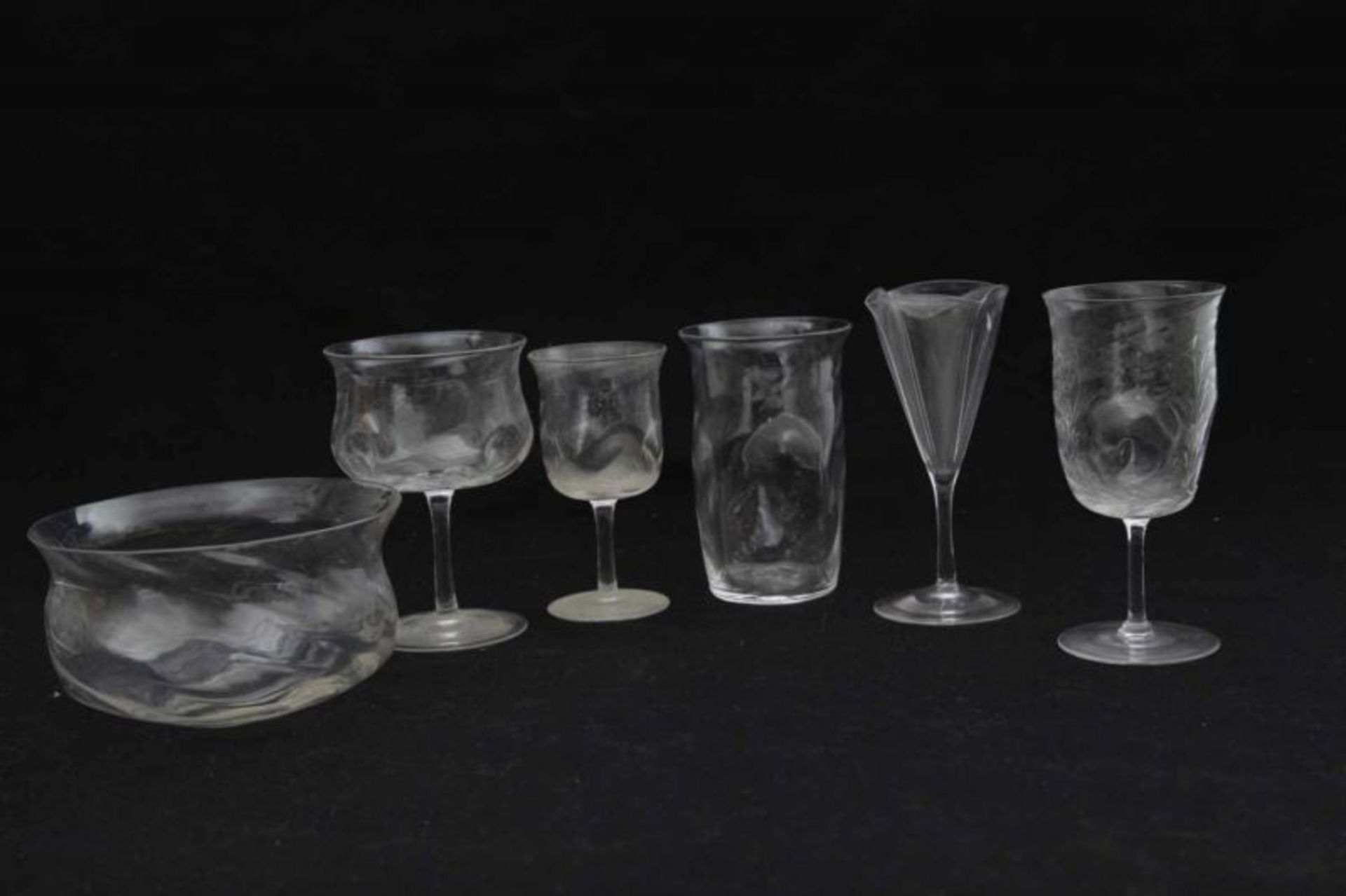 E. Bakalowits & Söhne, Vienna (attributed) A glass finger bowl, a water glass and three stemmed
