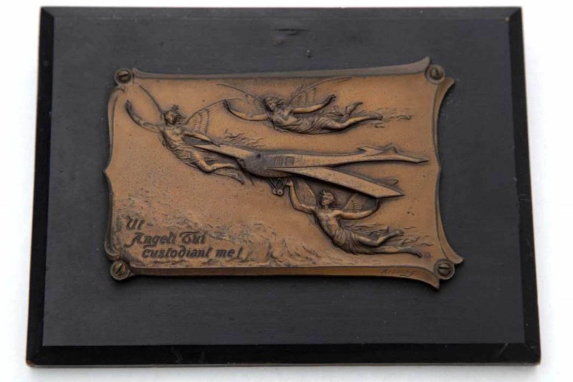 Art Nouveau A bronze coloured metal plaque mounted to a ebonised wooden panel, depicting three - Bild 2 aus 2