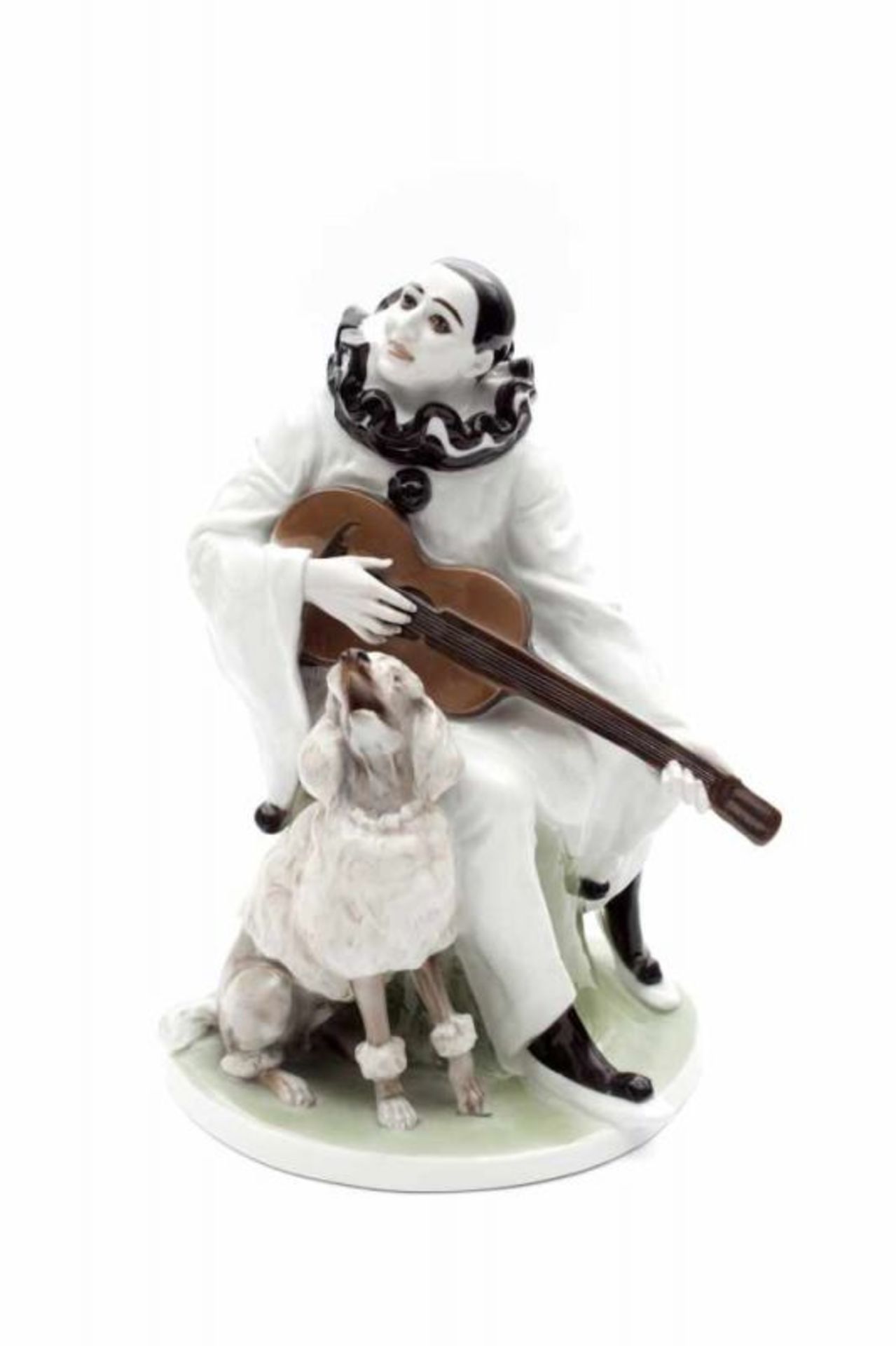 Rudolf Marcuse (1878-1929) A porcelain figure depicting a guitar playing Pierrot with a poodle,