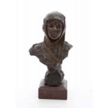 Emmanuel Villanis (1858-1914) A patinated bronze bust, on red stone base, titled to the foot: "
