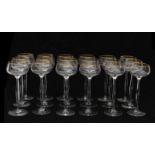 Hans Christiansen (1866-1945) Eighteen wine glasses on high stem with gilt top rim, produced by