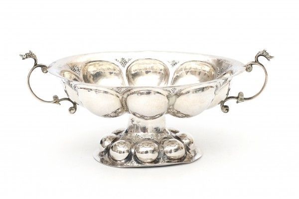 A silver brandy bowl. Maker's mark Heerens & Son, Schoonhoven. Date letter 1959. Lobed model.Lengte