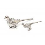 Two silver pheasants. Caster/sugarbox. The small one a caster the larger one probably a sugarbox.