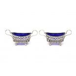 A pair of Dutch silver salts. With blue glass liners. Maker's mark A.A. van Demmeltraadt. Year