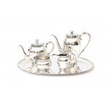 A four piece Dutch silver tea and coffee service with an oval tray. Imported by D.J. Aubert, 's-