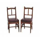 H.P. Berlage (1856-1934)A pair of oak Nieuwe Kunst chairs, the seats reupholstered in brown