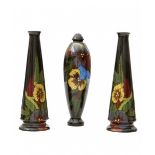 Porceleinfabriek De Kroon, Noordwijk (1906-1910)A three-part ceramic set of vases decorated with