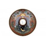 Fayence- en Tegelfabriek HollandAn Art Nouveau ceramic wall plate with integrated clock, decorated