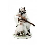 Rudolf Marcuse (1878-1929)A porcelain figure of a Pierrot with poodle, produced by Rosenthal, Selb,