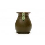 Brouwer's Aardewerk N.V. LeiderdorpA ceramic vase glazed in shades of green, decorated with two