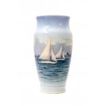 Royal CopenhagenA porcelain vase decorated with sailboats before a city, signed with company marks