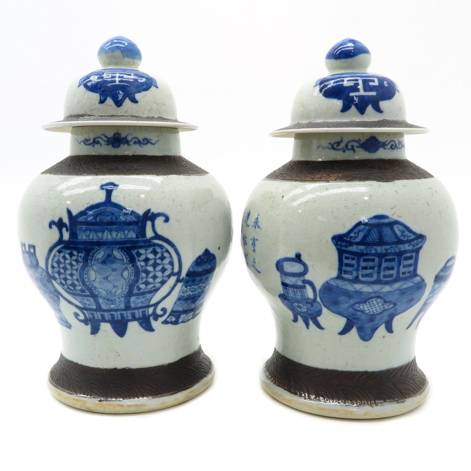 Pair of Lidded Vases