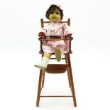 Vintage Doll in High Chair