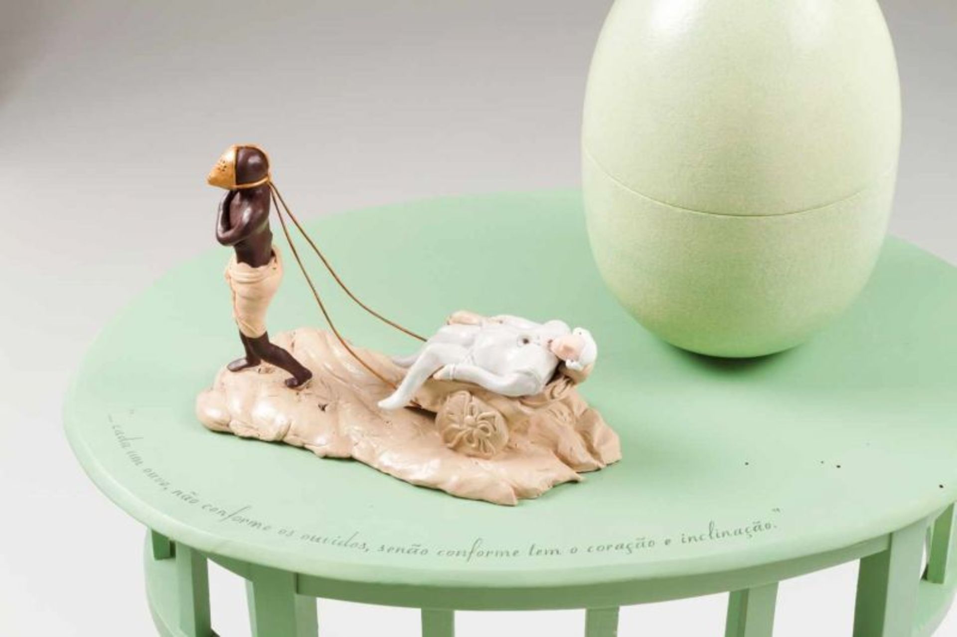 Vasco Araújo (n. 1975) Untitled From "Debret" series Sculpture with painted wood table and egg, - Bild 2 aus 2
