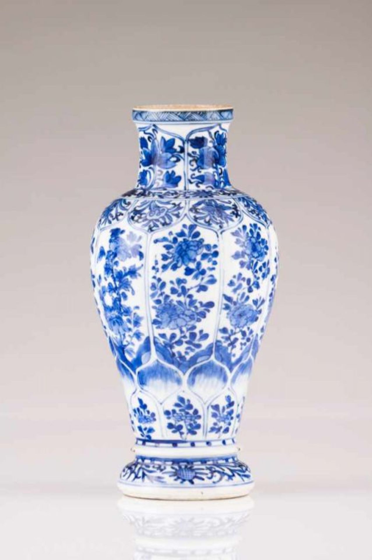 A vase Chinese porcelain Blue underglaze decoration depicting floral motifs Kangxi Period (1662-