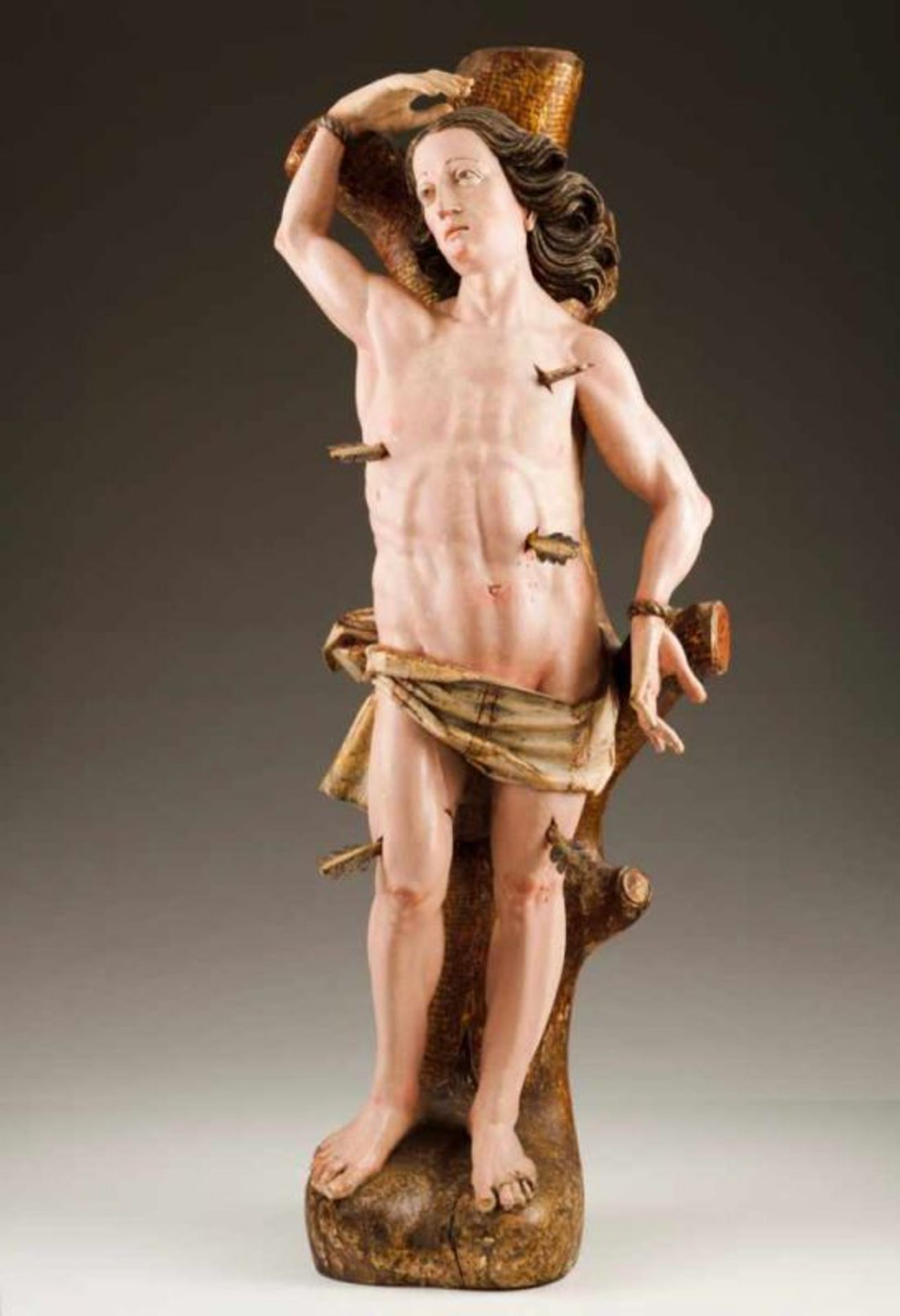 Saint Sebastian A large wood sculpture Polychrome and gilt decoration Portugal, 18th century