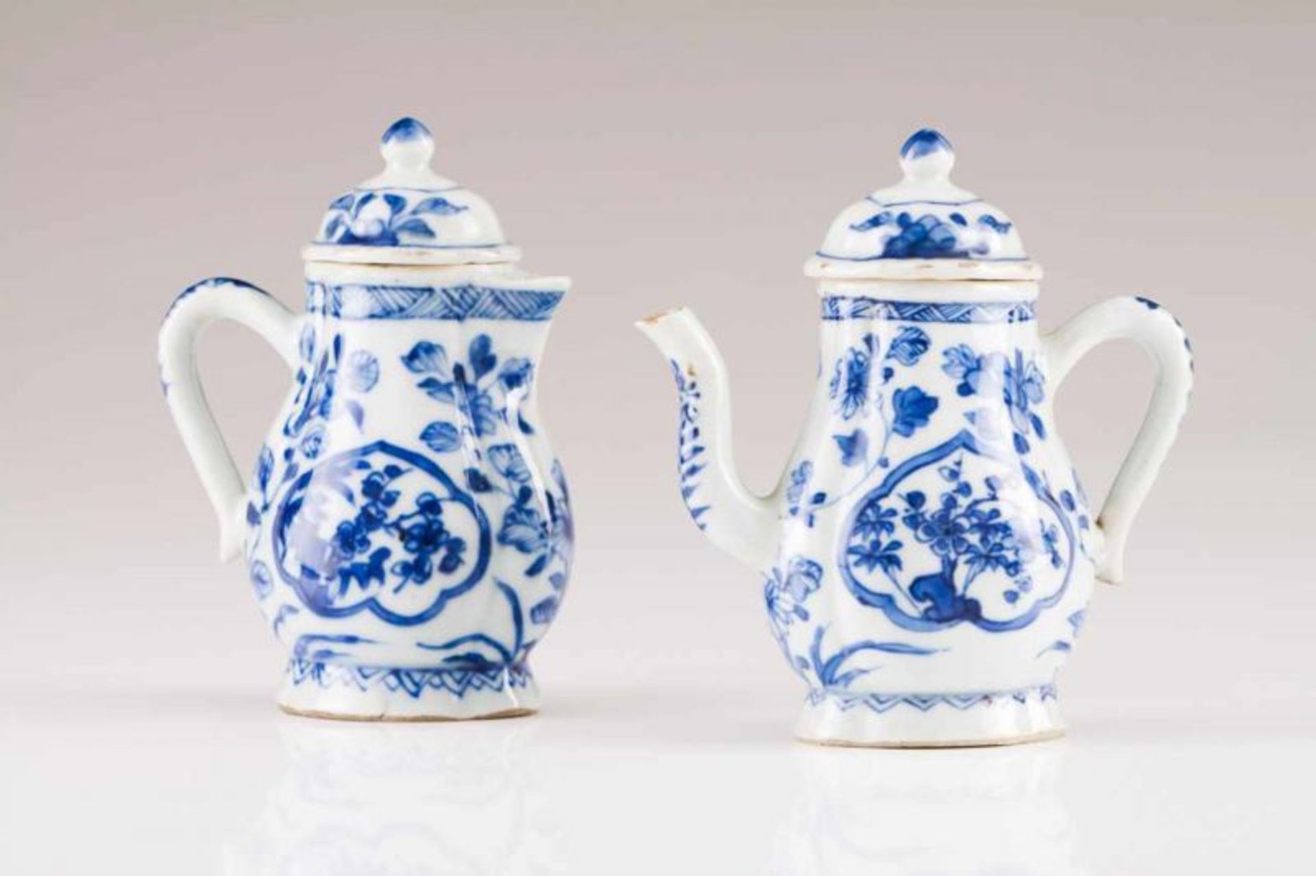 Two cruets with cover Chinese export porcelain Blue underglaze decoration depicting floral motifs