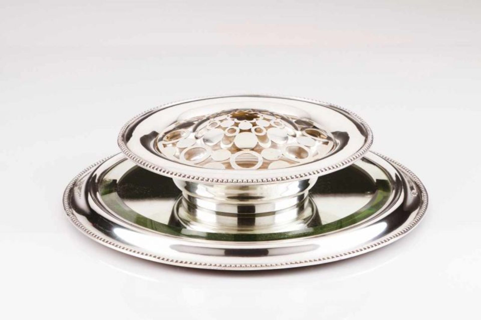 A Portuguese silver centrepiece/flower bowl Plain decoration with beaded friezes, pierced strainer