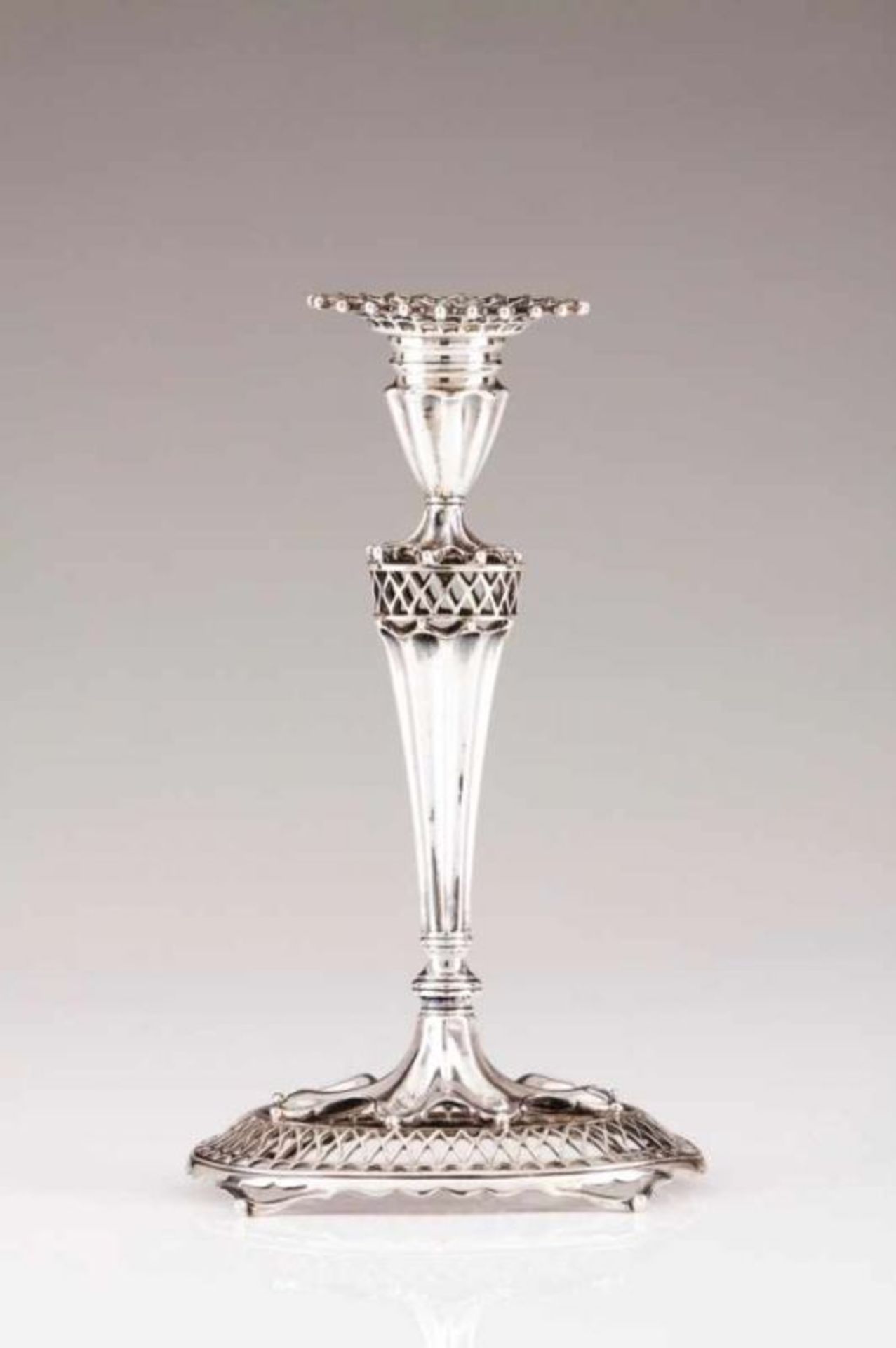 A pierced candlestick, MERGULHÃO Portuguese silver Of neoclassical design with fluted and pierced