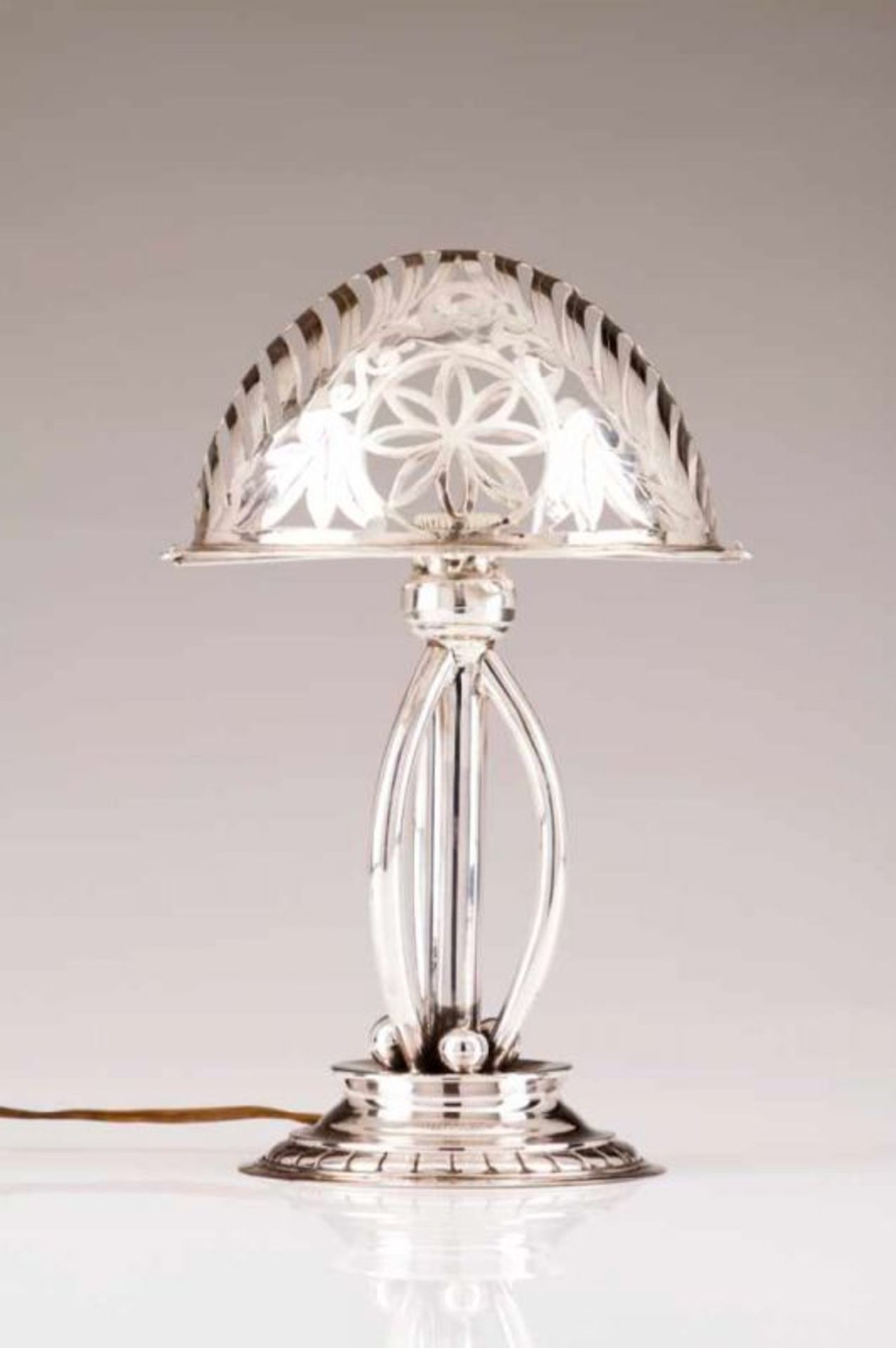 An Art Deco table lamp Portuguese silver Geometric and tubular decoration, pierced shade wit
