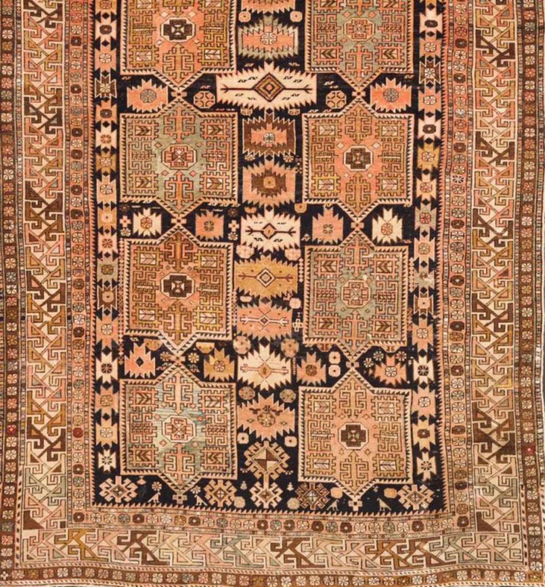 A Kerman carpet, Iran Cotton and wool with geometric decoration in beige, brown and salmon 430x290