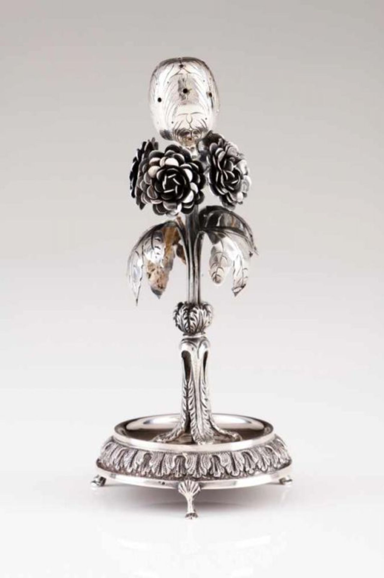 A toothpick holder Portuguese silver Designed as a branch with flowers, leaves and fruit; round