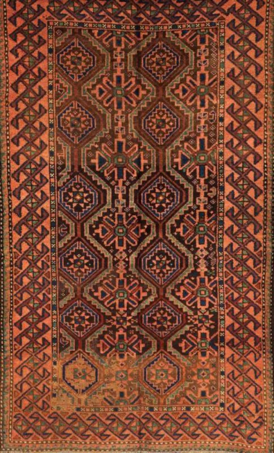 A Baluchi carpet, Iran Cotton and wool with geometric decoration in salmon, beige and blue 165x100