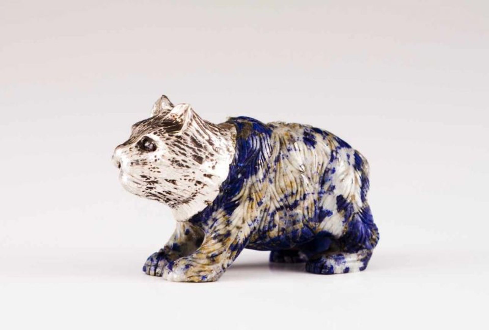 A cat, LUIZ FERREIRA A lapis-lazuli and silver sculpture Porto assay mark (after 1985), maker's